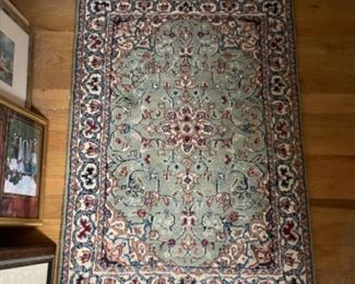 Persian area rug. Measures 34” x 24.”