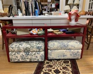 Red two-tiered console. Measures 64” W x 18” D x 30.5” H.