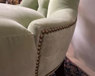 Slipper chair upholstered in green velvet upholstery with nailhead trim. Measures 30" W x 28" D. Photo 2 of 2.