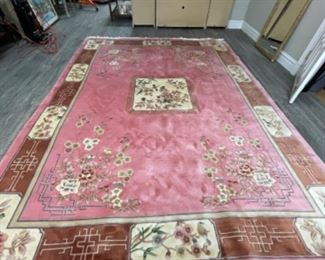 Vintage pink area rug. China. Measures 9' x 11’ 10”. Photo 1 of 2.