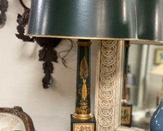 Pair of green wood table lamps with gilt detailing. Measures 28" H.