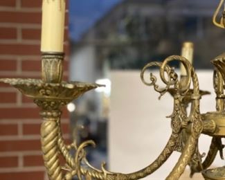 Antique 6-arm brass Italian chandelier with feather plume detailing. Measures 28" H x 24" W. Photo 4 of 4.