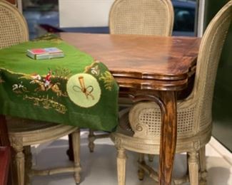 Vintage dining/game table. Measures 36" x 36" x 31" H with 28" clearance. Extends to 60" L with two built in hidden leaves. Photo 1 of 2.