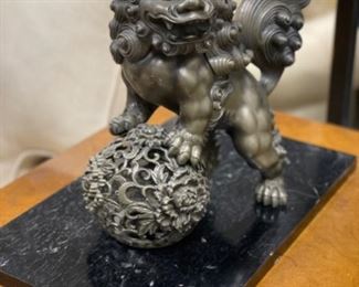 Metal Foo Dog on stand. Measures 12” x 12”. Photo 1 of 2.
