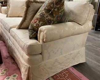 Upholstered three-seat sofa. Measures 78" W x 34" D. Photo 2 of 2.