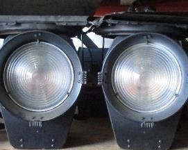 LOT OF 4 STRAND FRESNELITE STUDIO 8"LIGHTS WITH HANGERS AND C CLAMPS, BARN DOORS