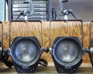 LOT OF 4 STRAND FRESNELITE STUDIO 6"LIGHTS WITH HANGERS AND C CLAMPS, BARN DOORS	