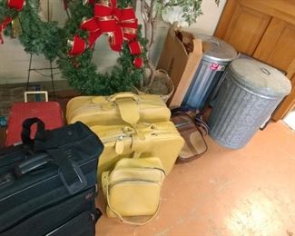 Vintage luggage . clean trash cans. 