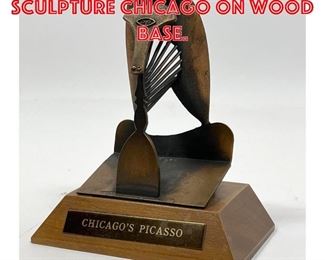 Lot 76 Picasso The Lady sculpture Chicago on wood base.