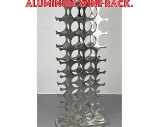 Lot 168 4 Tall Modern Aluminum Wine Rack. 