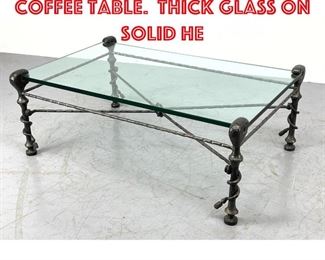 Lot 309 Giacometti Style Coffee Table. Thick glass on solid he