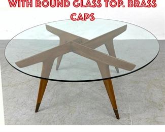 Lot 348 GIO PONTI Coffee Table with Round Glass Top. Brass caps