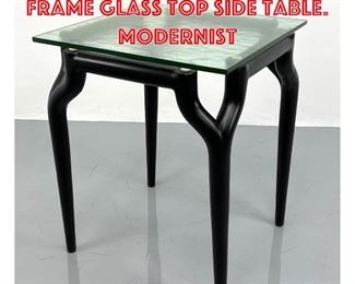 Lot 402 KRISTIAN Ebonized Frame Glass Top Side Table. Modernist