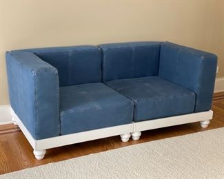 Denim upholstered loveseat or, two corner chairs, with white wood frame. Measures 66” W x 33” D. Photo 2 of 3.