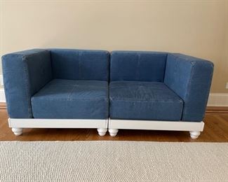 Denim upholstered loveseat or, two corner chairs, with white wood frame. Measures 66” W x 33” D. Photo 1 of 3.