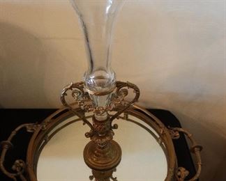 Glass flute on mirrored base