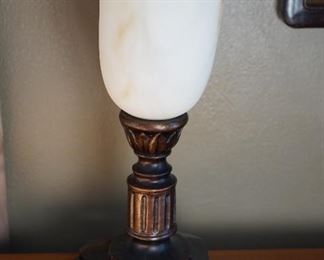 reproduction mantel light with frosted shade.