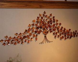 One of two exceptional metal art wall scultures.