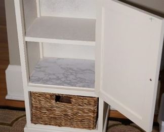 One of many very nice storage cabinets in white laminate or wood painted black, white.