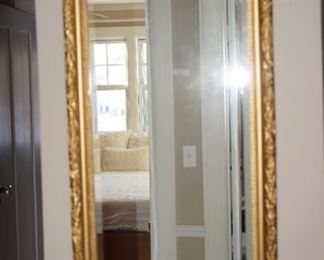 gold tone and gesso bevelled wall mirror