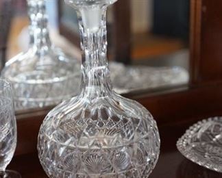 selection of classic cut glass pattern decanters with fine stoppers
