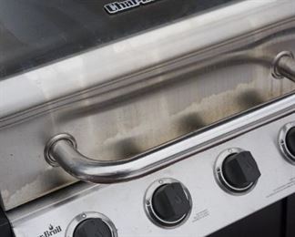 Char Broil gas grill. Very clean condition with tanks and also a cover.