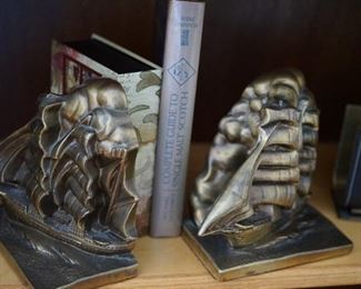 Brass bookends of ships.