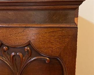 One veneer chip on top right of cabinet