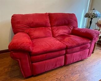 Berkline red reclining loveseat - manual (space saving wall recliner), 35"H x 38"D x 68"W,  was $315, NOW $250