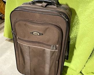 Brown suitcase double wheels, was $20, NOW $10