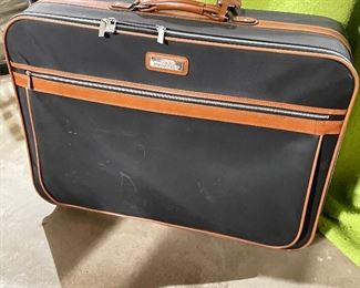Black & brown suitcase on 4 wheels, was $30, NOW $20