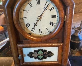 One of several antique clocks...great walnut case!