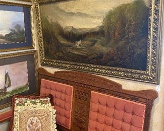 Unusual rose settee surrounded by gorgeous landscape oil paintings and prints!