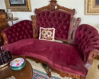 Outstanding cranberry Settee!  Look at that rug!