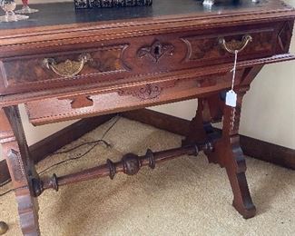 Sewing table... look at the "belly" of the table used for storing needlework/sewing!