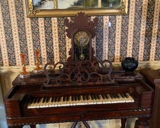 Small Rosewood piano.... will fit in any room!
