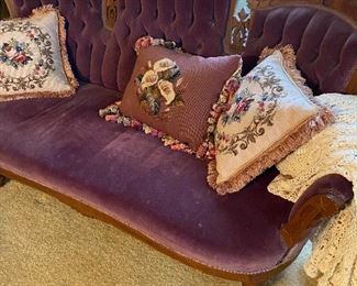 Violet velvet settee with nice carving and needlepoint pillows!