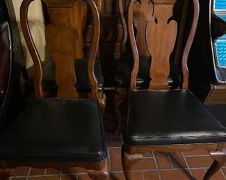 4 Queen Ann chairs with black leather seats!