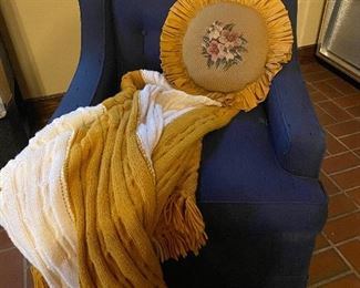 Comfy blue chair with gold/white afghan!