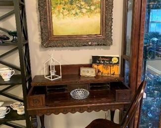 antique desk, art, books, ashtrays, chair