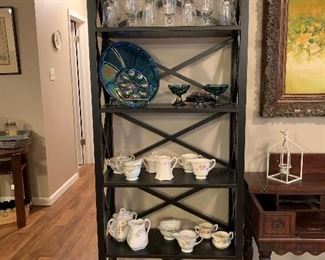 bookcase, blue carnival glass, etched stemware, vintage sugar/creamer sets