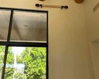 Set of silk curtains hang from here they are very long check back on Tuesday afternoon for the length and width. 