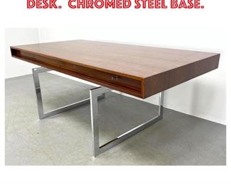 Lot 1201 Bodil Kjaer Rosewood Desk. Chromed steel base. 