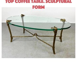 Lot 1214 Bronze Designer Glass Top Coffee Table. Sculptural form