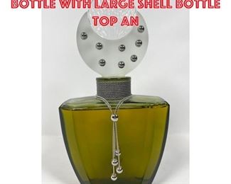 Lot 1292 Oversized Perfume Bottle With Large Shell Bottle Top an