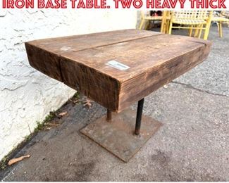 Lot 1411 Rustic Thick Wood Top Iron Base Table. Two heavy thick 