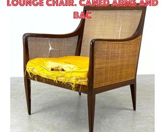 Lot 1464 Dunbar style Modernist Lounge Chair. Caned Arms and Bac