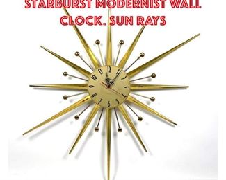 Lot 1728 PHINNEY WALKER Starburst Modernist Wall Clock. Sun rays