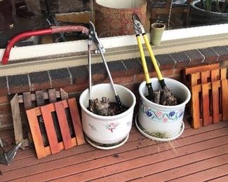 A few yard tools, pot trolleys, more planters
