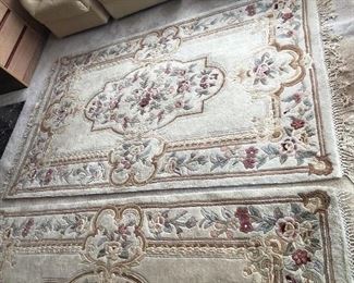 Chinese wool rug - we have 2 alike. Each 57” x 91” not including fringe. They’re a little more tan in color than they look in photo. 